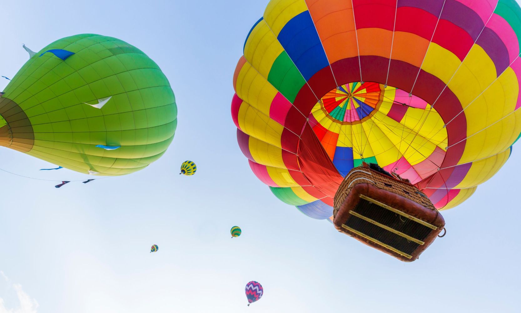 a group of colorful hot air balloon in the sky near Pagosa Springs Colorado